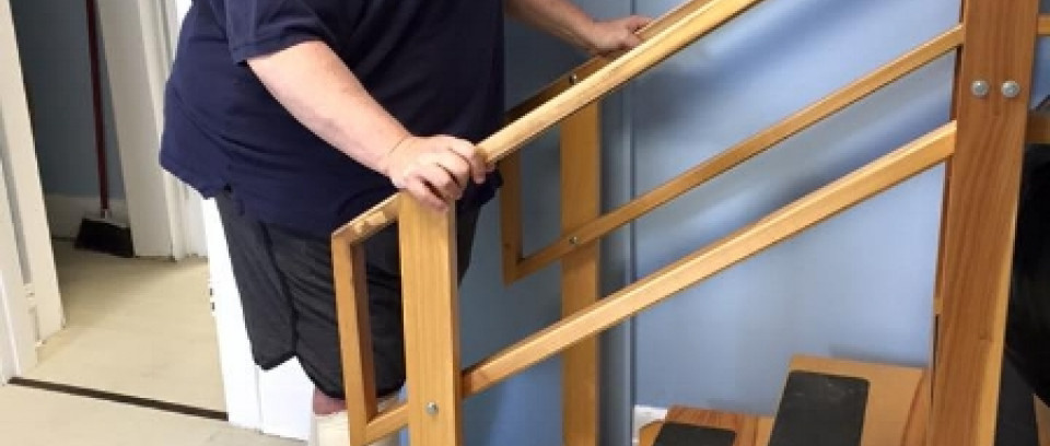 Man walking up the steps for balance condition