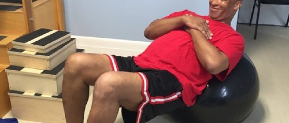 Man blancing on ball