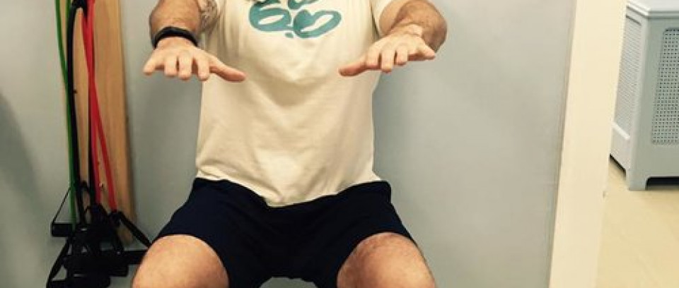 Man doing wall sit